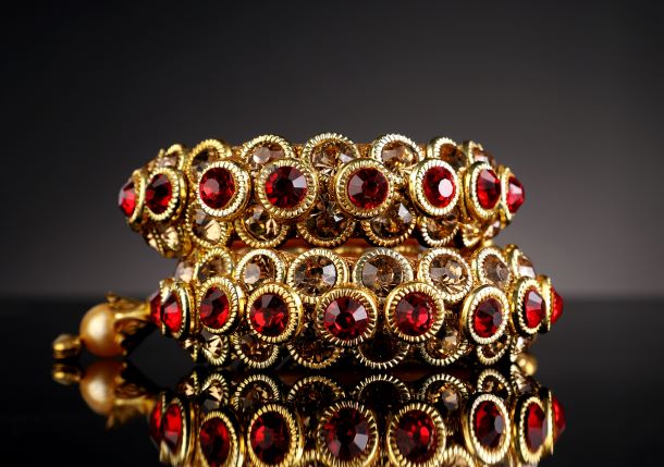 Ruby gemstones set in gold bracelet