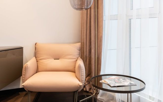 Soft chair by window with round table