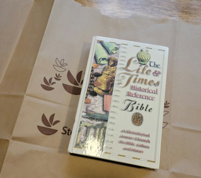 Bible on paper bag before covering