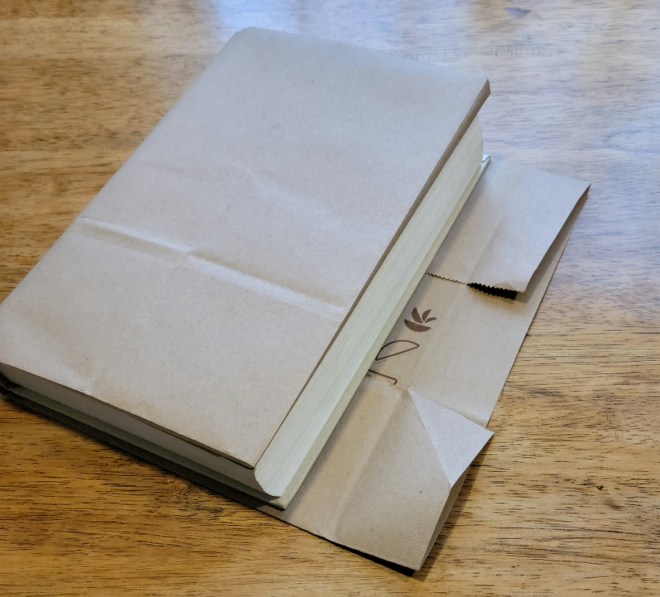 Folding paper bookcover