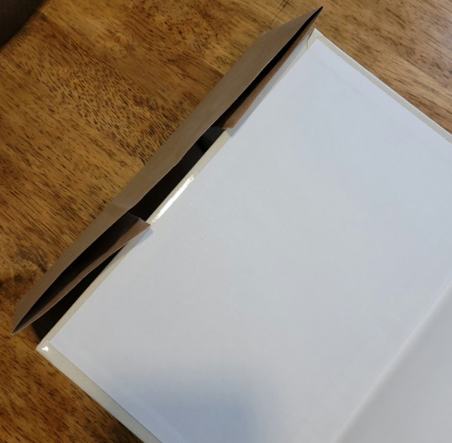 Edge of paper bookcover flap