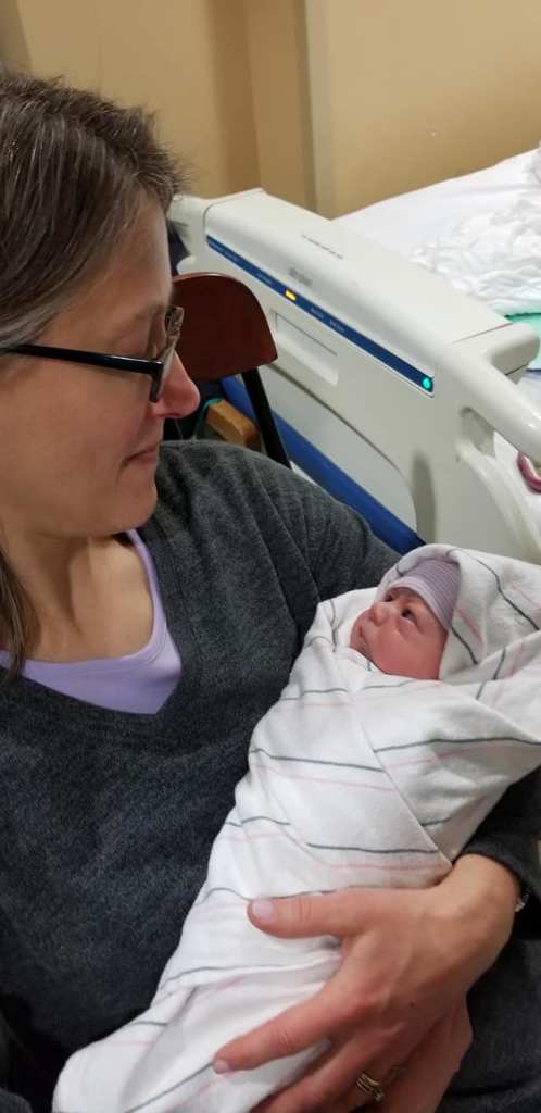 Newborn with his grandmother