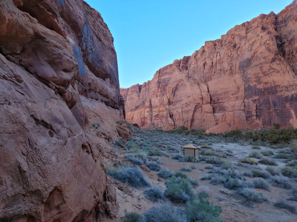 Campsite toilet in desert canyon
