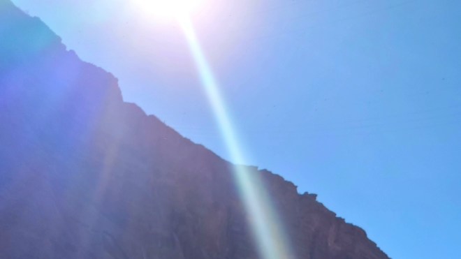 Beam of Sunlight Shining Over a Cliff
